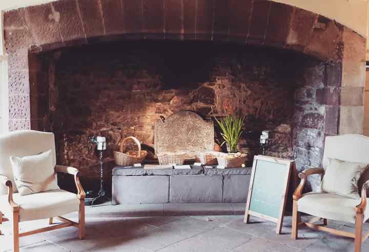 Acorn Bank. National Trust. A Large fireplace. Big brick fireplace. 4 freckled faces.